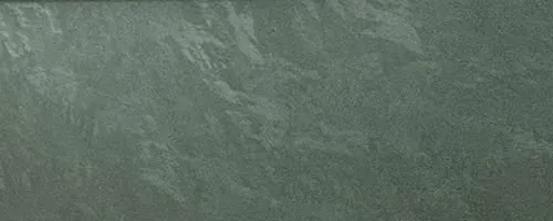 Detalle de la textura del estuco verde aplicado en un salón